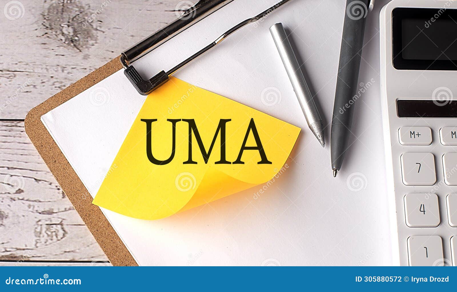 uma word on a yellow sticky with calculator, pen and clipboard