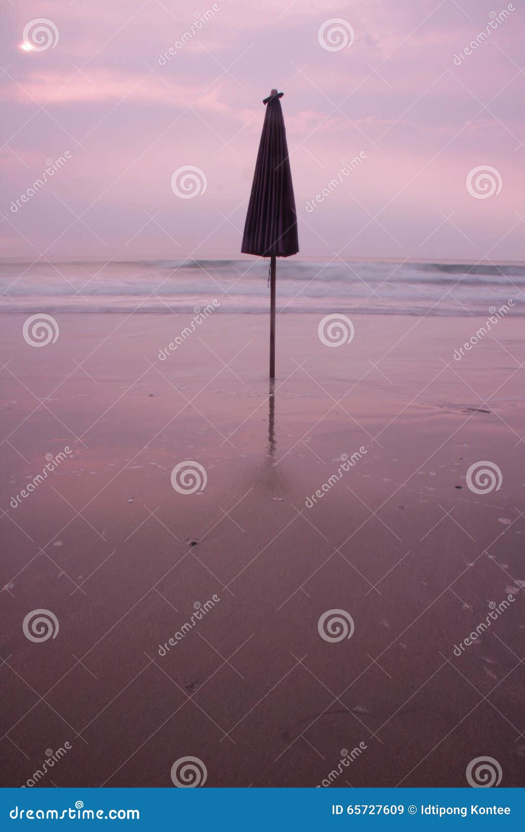 Umbrella on the beach stock image. Image of leisure, tropical 65727609