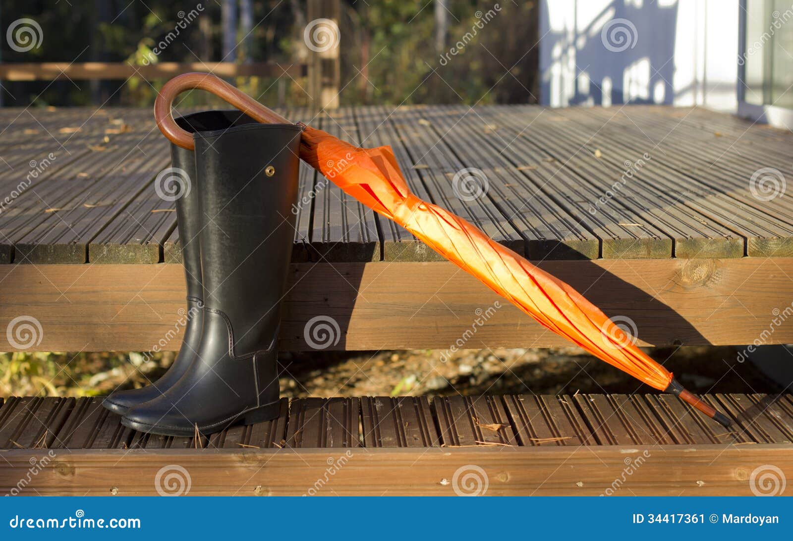 Umbrella and boots stock image. Image of clothes, terrace 34417361