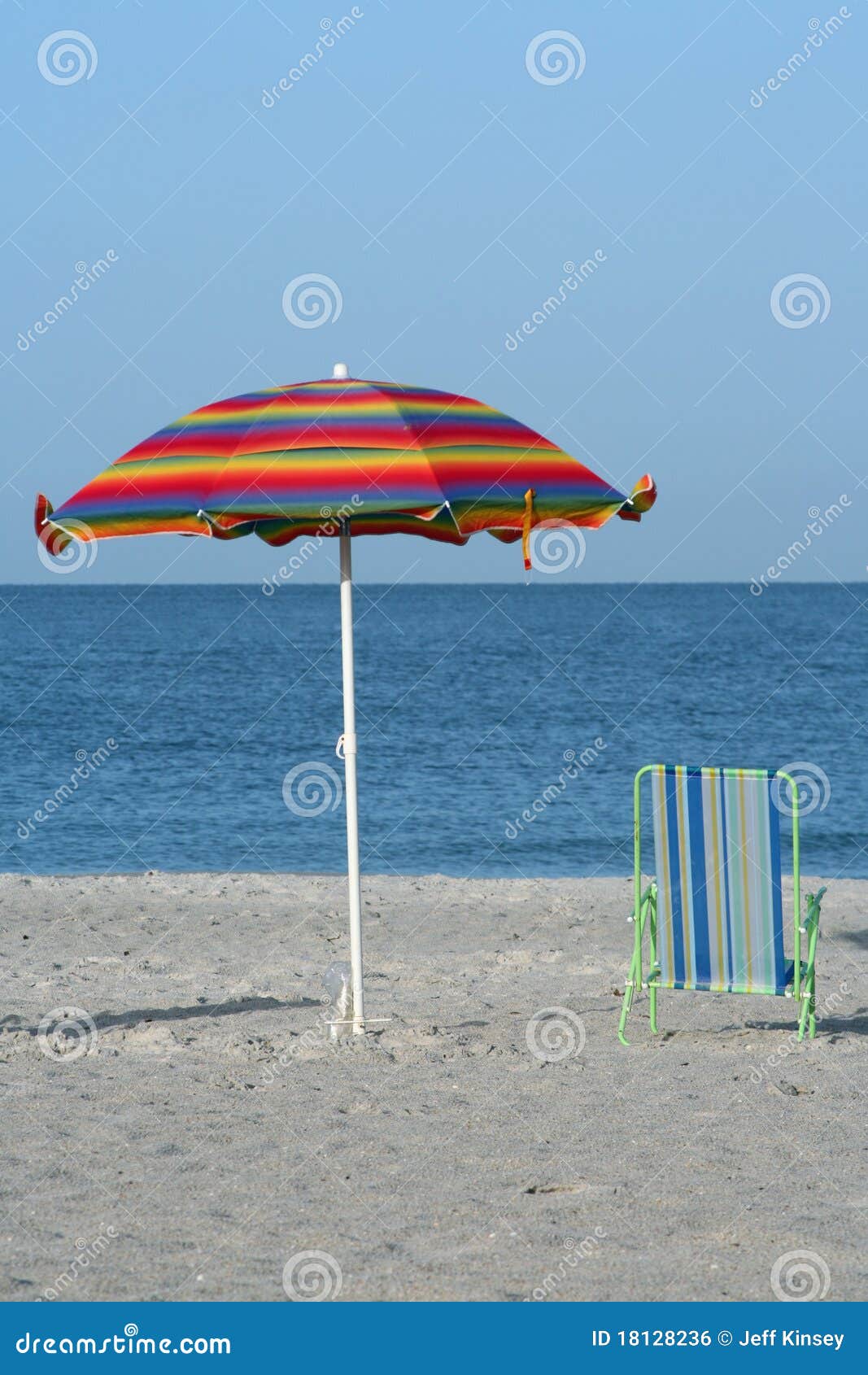 Umbrella and Chair stock photo. Image of scenic, tropical - 18128236