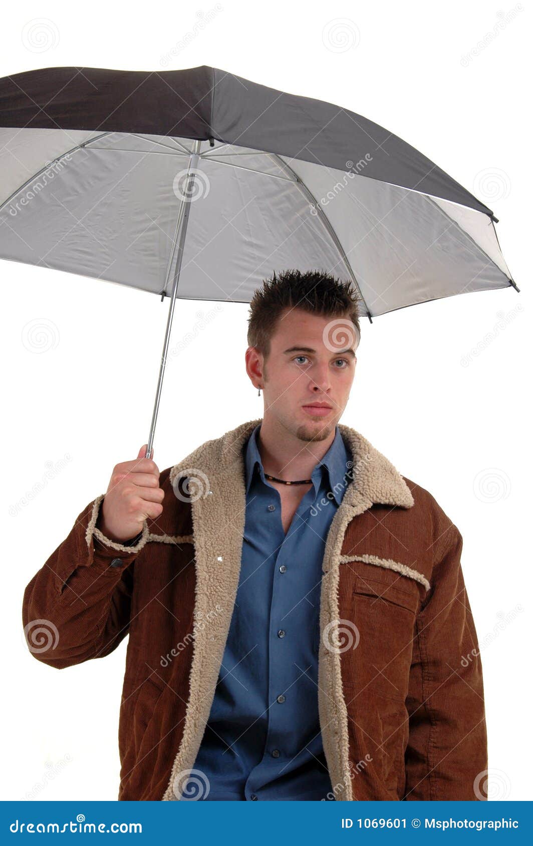 Umbrella and jacket stock image. Image of young, male 1069601
