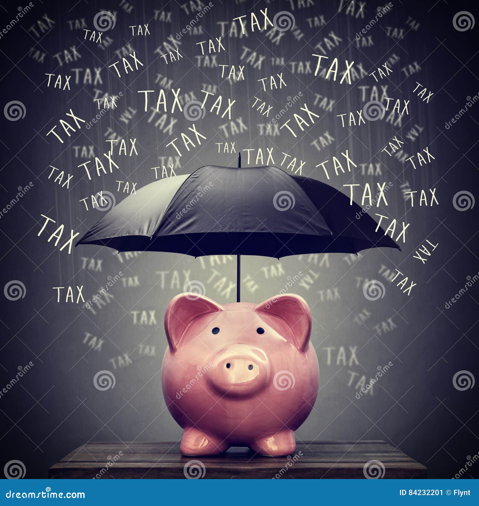 umbrella protecting piggy bank savings from tax