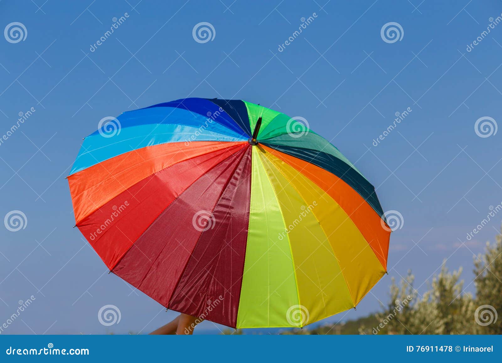 Umbrella on sky background stock photo. Image of person 76911478