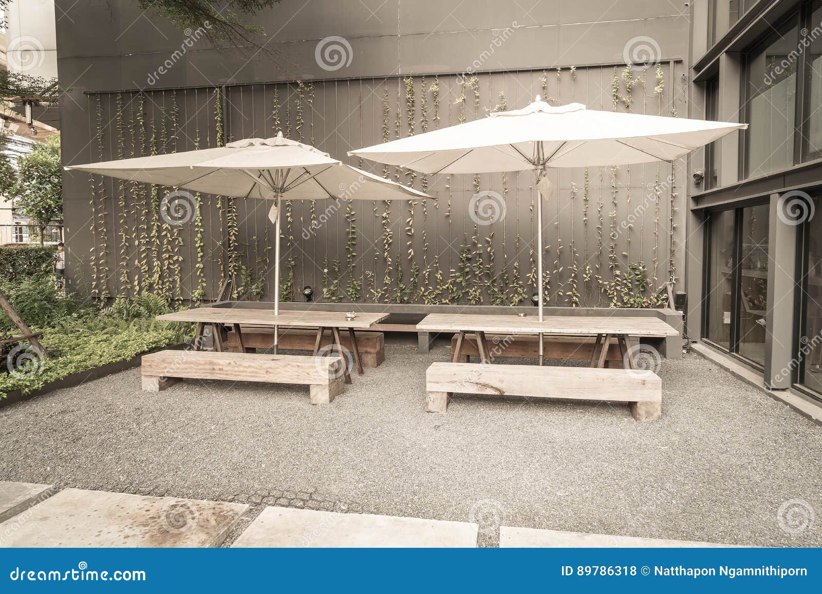 Umbrella and wood bench stock photo. Image of outdoors 89786318