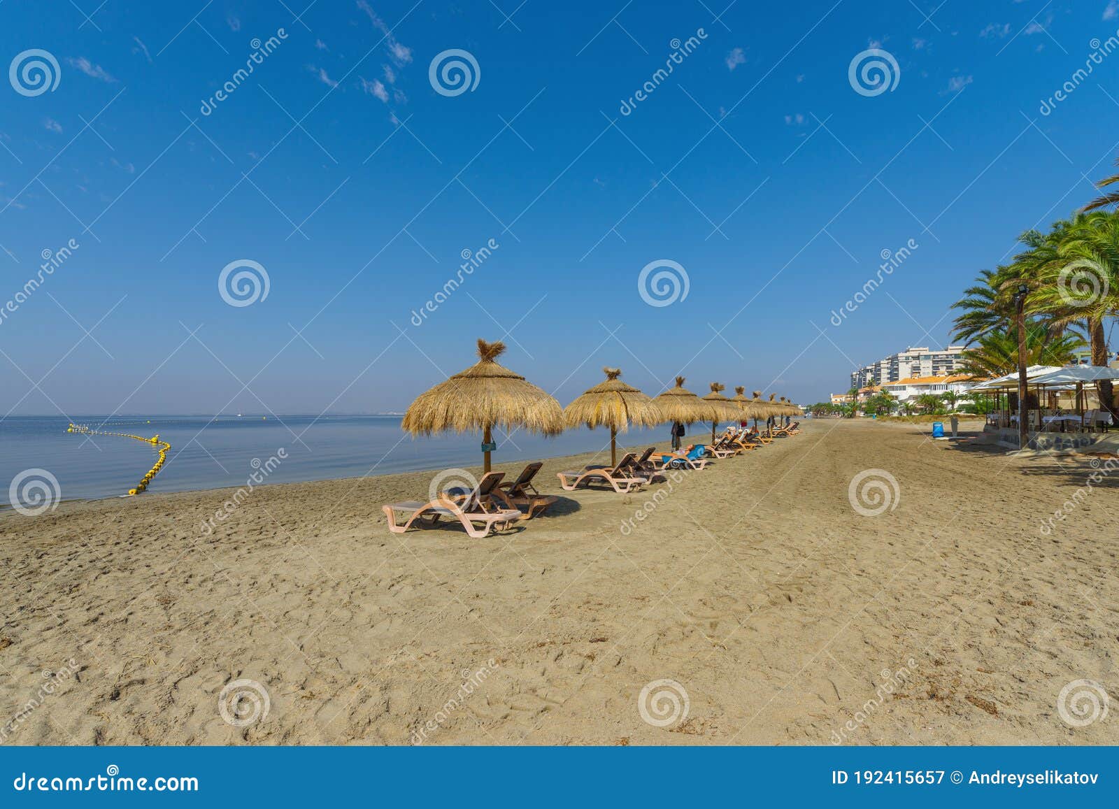 umbrellas on the beach by the sea. la manga del mar menor