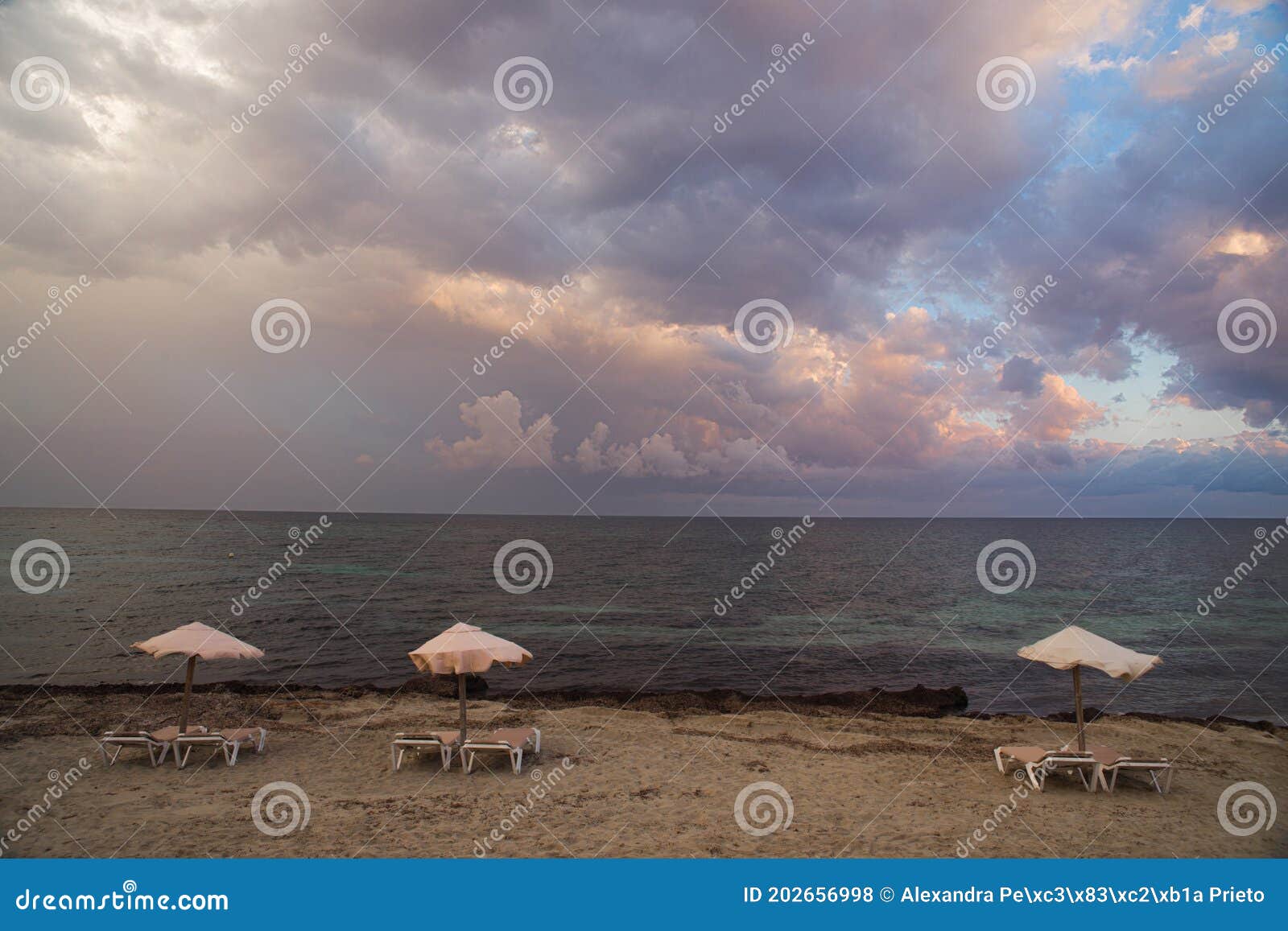 umbrellas and hammocks on the empty beach