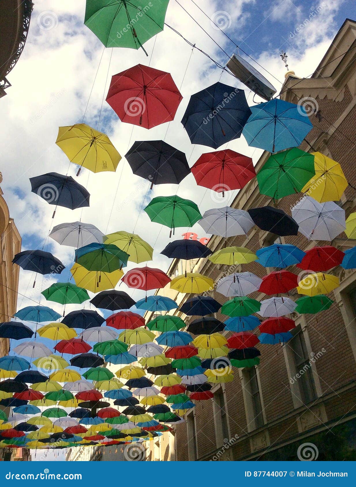 Umbrellas over street stock image. Image of pavement 87744007