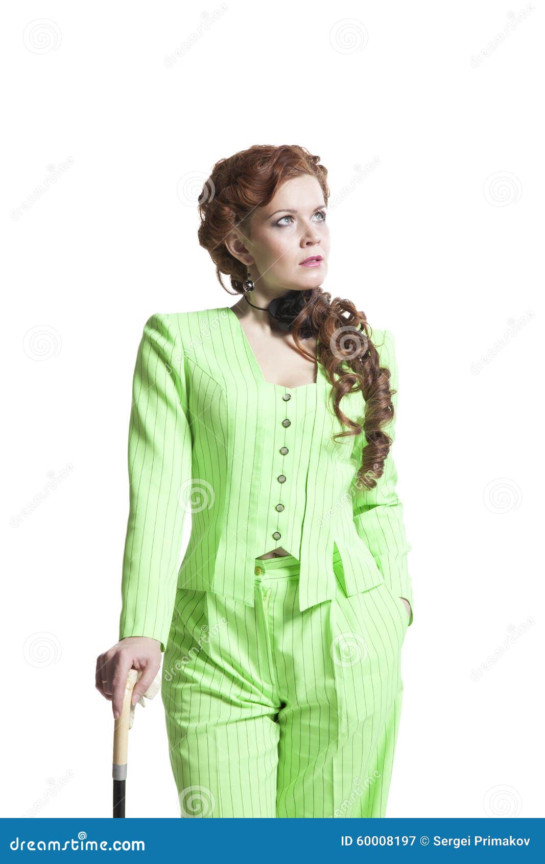 ponerse en cuclillas yermo calculadora Una Mujer En Un Traje Verde Claro Del Pantalón Imagen de archivo - Imagen  de formado, modelo: 60008197