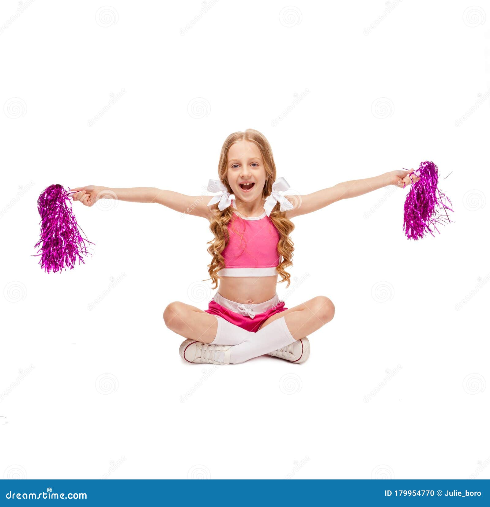 Una Ragazza in Costume Da Cheerleader Siede Con Un Pomo Fotografia Stock -  Immagine di siedasi, bello: 179954770