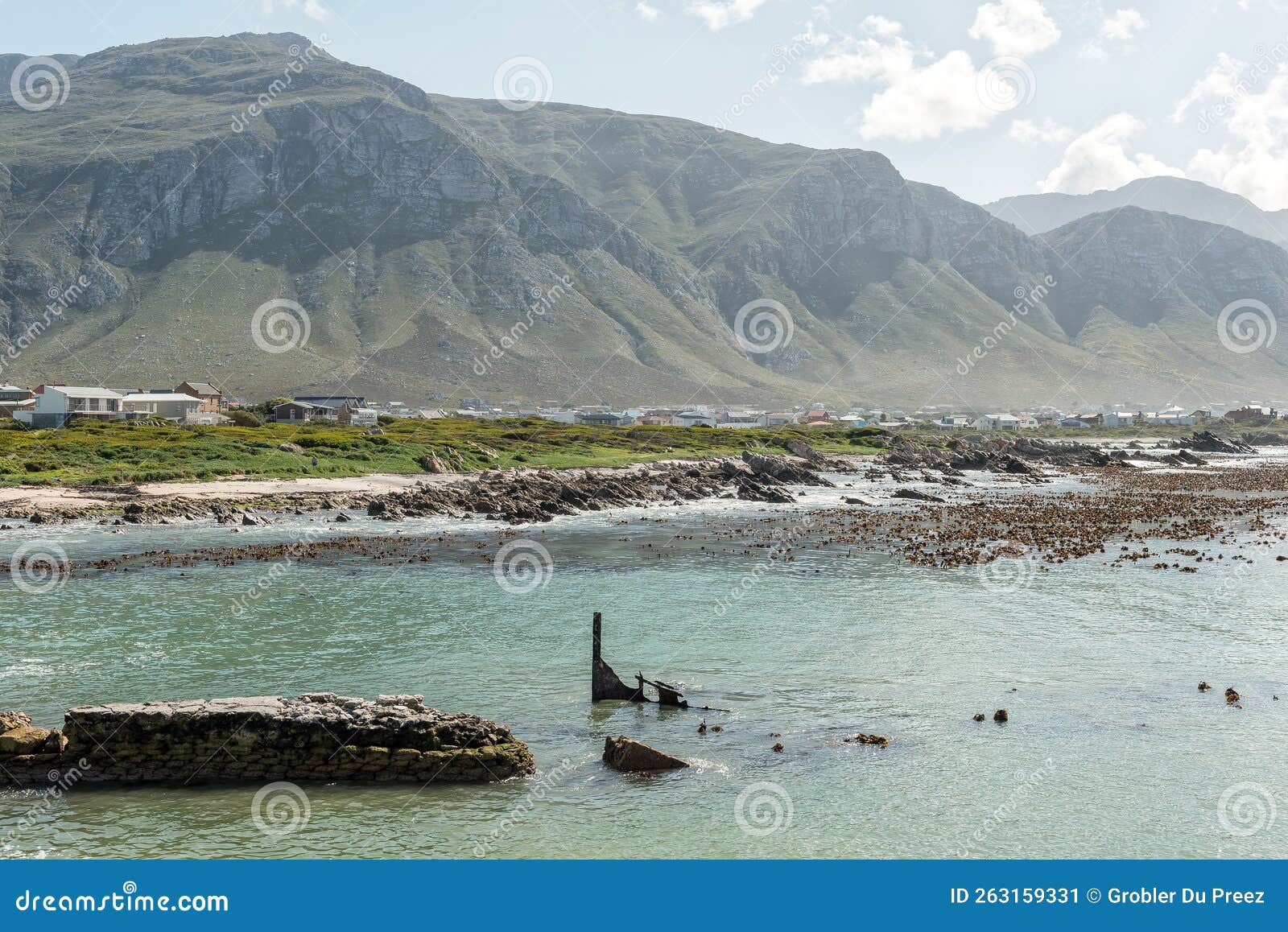 Una Shipwreck at Stony Point with Bettys Bay in Back Stock Image