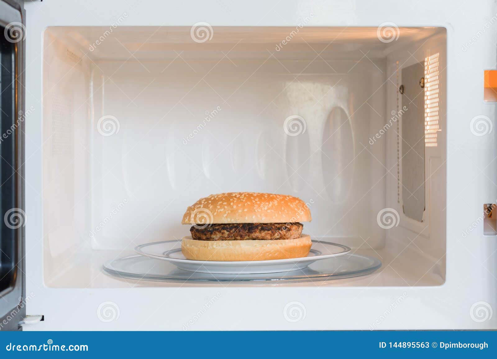 Microwave Hamburger stock image. Image of hamburger 144895563