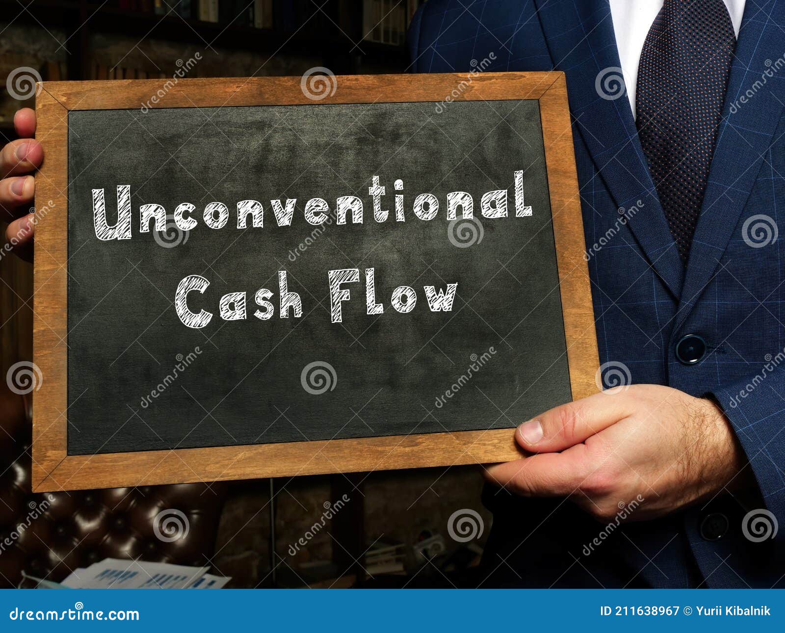 unconventional cash flow inscription on the black chalkboard