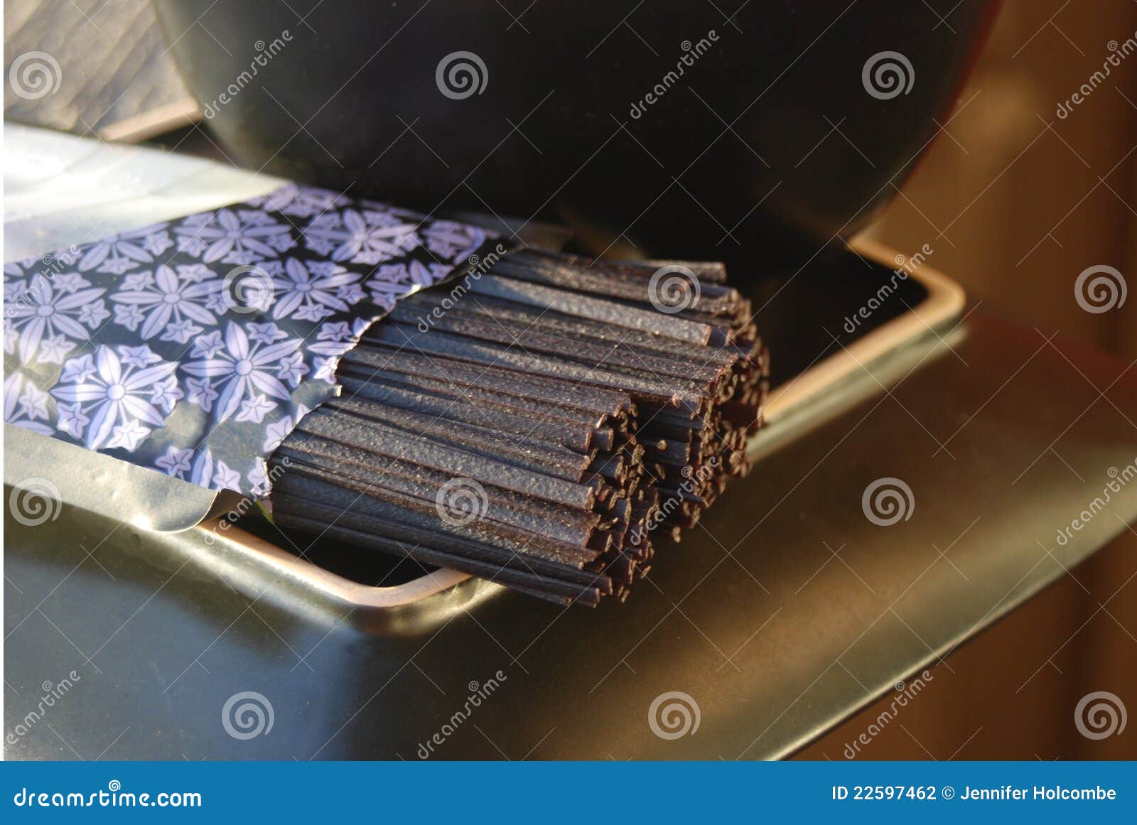 uncooked black rice soba noodles on a plate