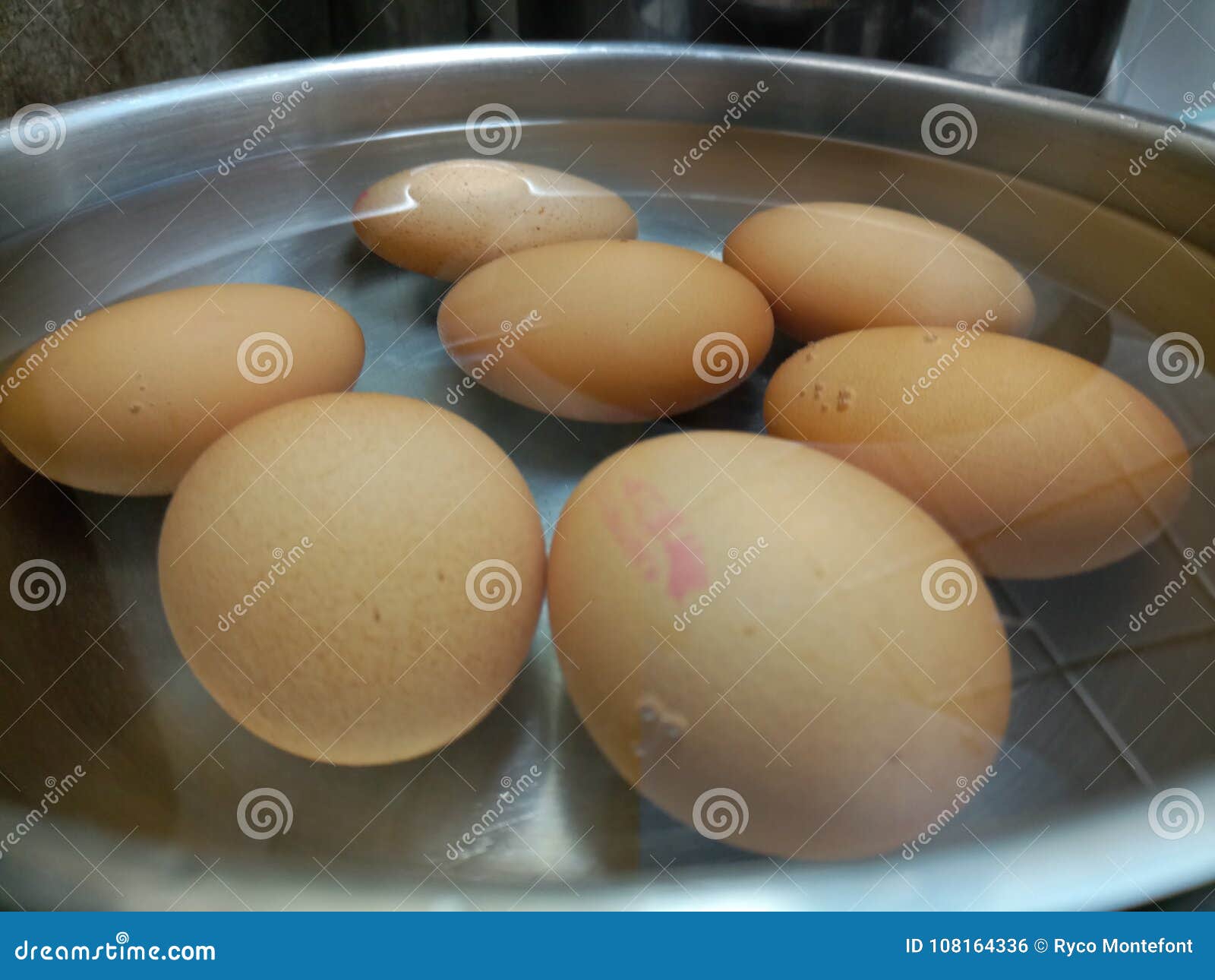 Uncooked Hard Eggs Boiling in Hot Water Stock Photo Image of round