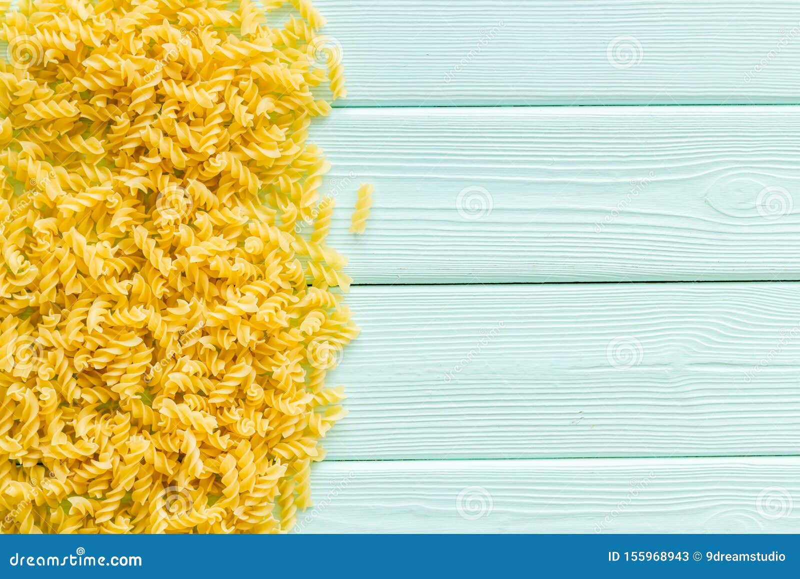 Uncooked Paste On Mint Green Wooden Table Background Top View Mockup Stock Image - Image of ...