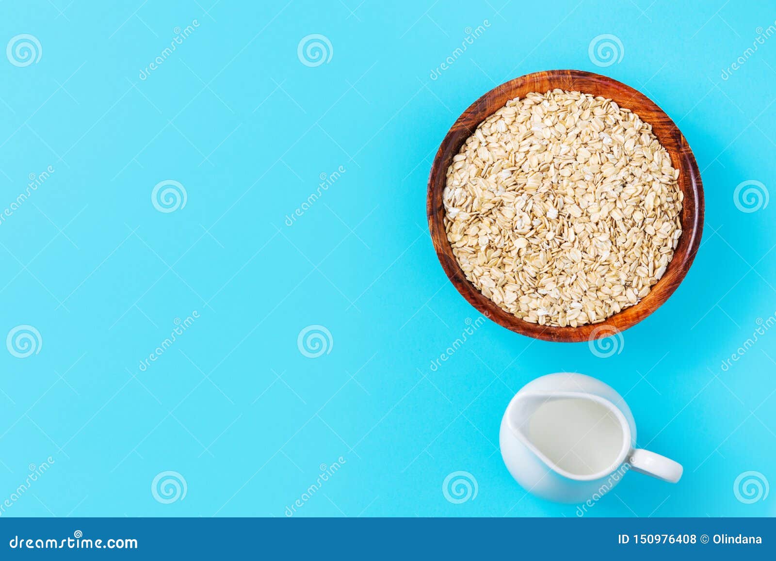 Uncooked Rolled Oats in Bamboo Bowl Plant Milk in White Ceramic Jug on ...