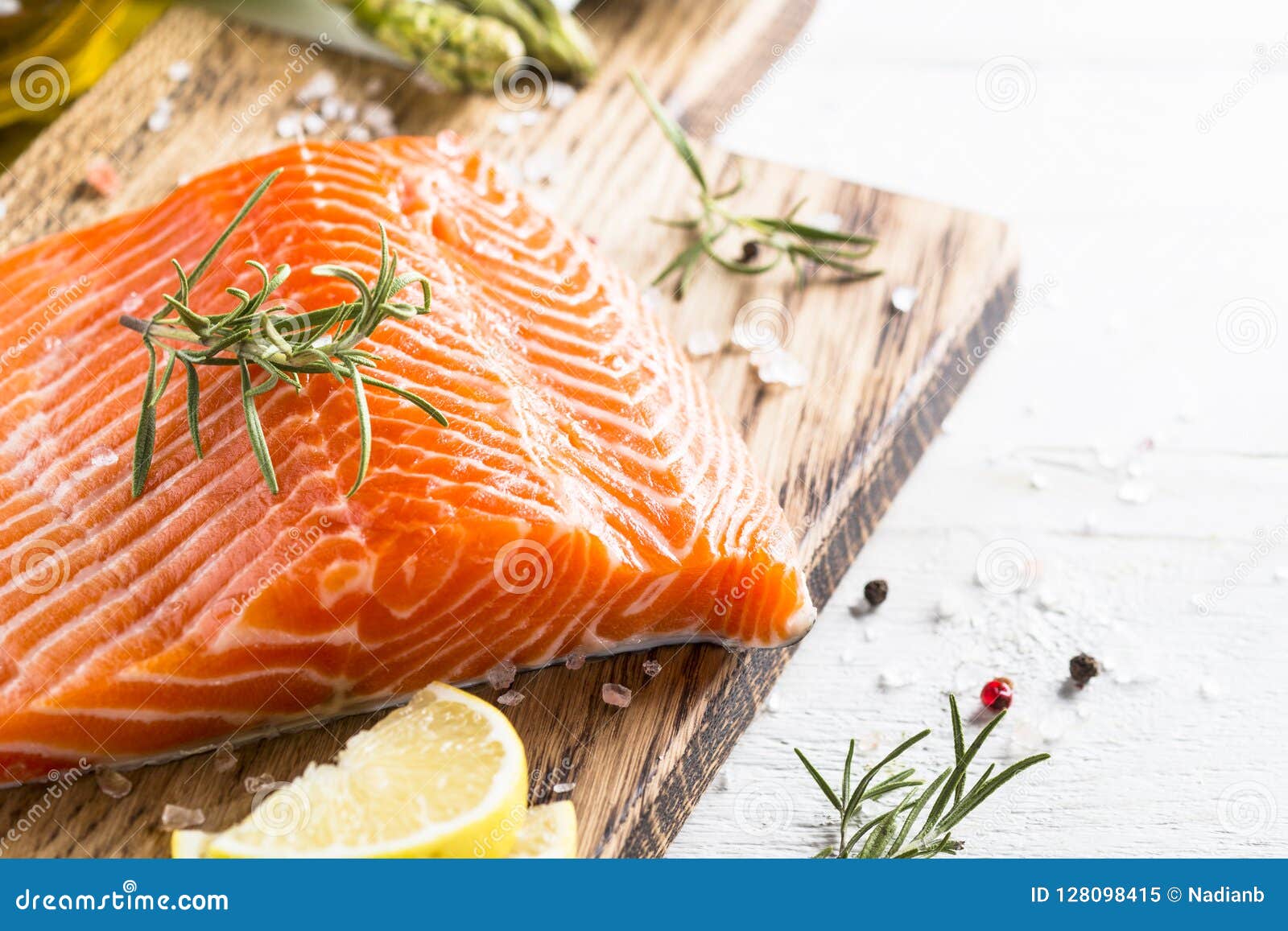 Uncooked Salmon Fillet with Lemon Sea Salt and Rosemary on White Stock ...