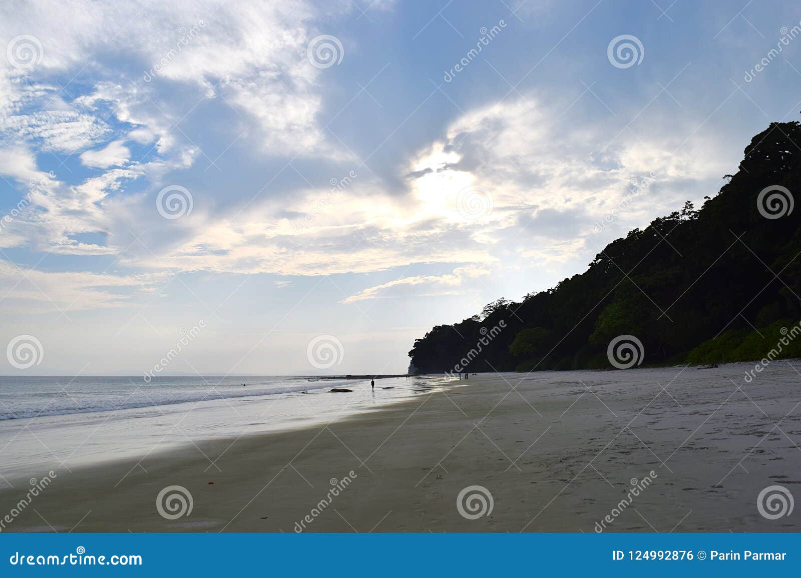 uncrowded and pristine white sandy beach on a pleasant evening - radhanagar, havelock island, andaman nicobar islands, india