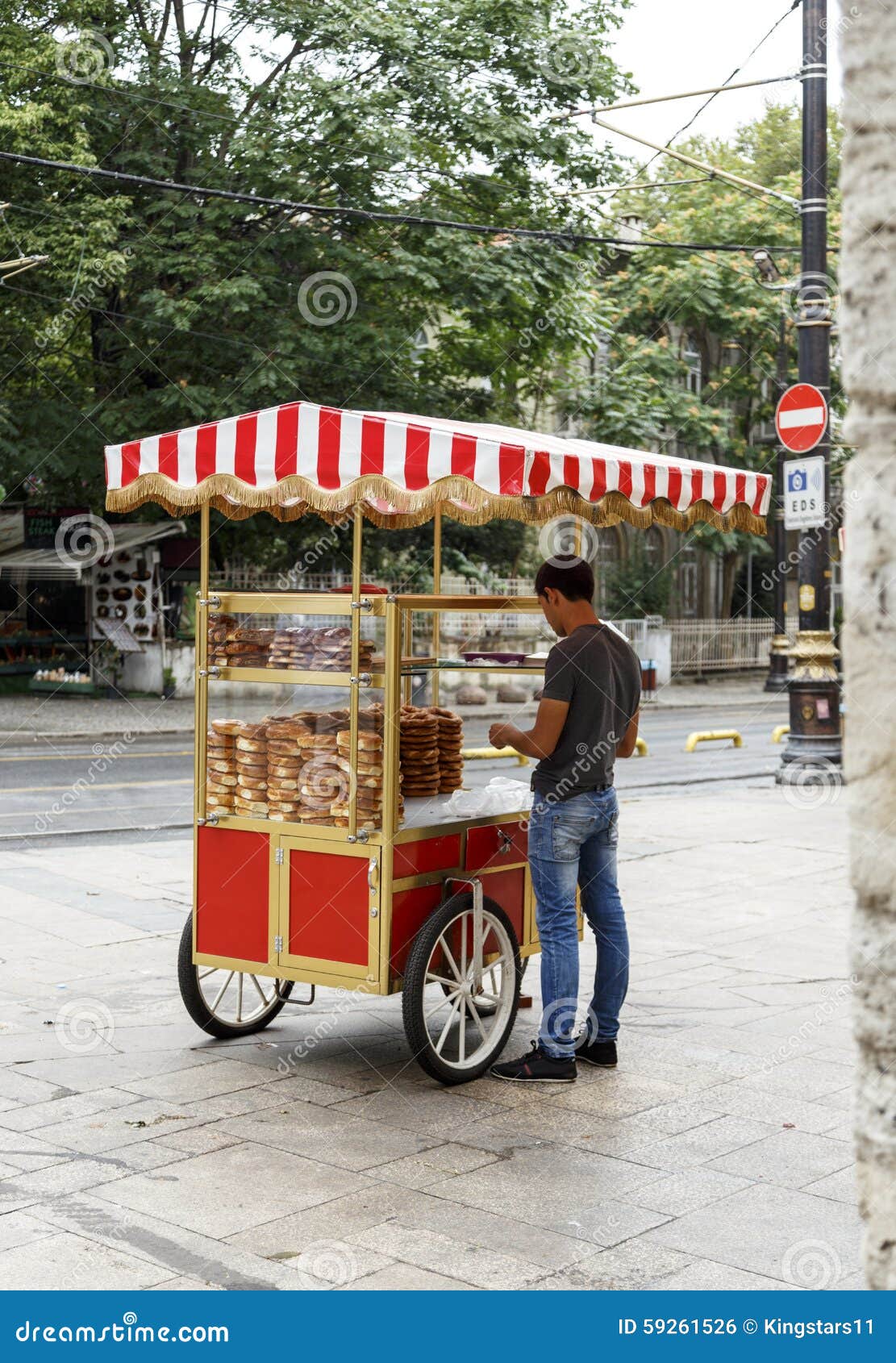 undefined man with simit cart ,istanbul, turkey.