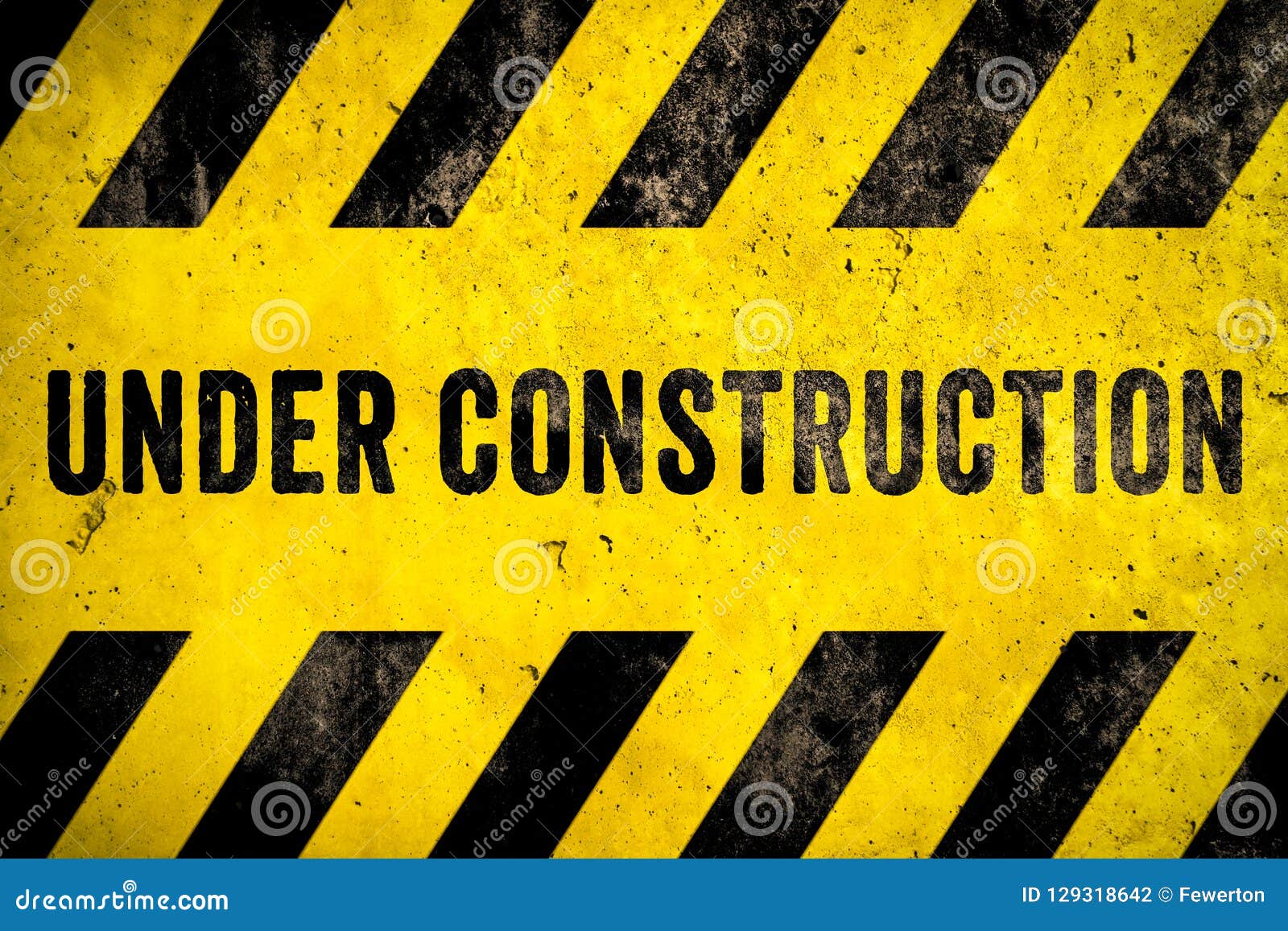 Under Construction Warning Sign Text with Yellow Black Stripes Painted ...