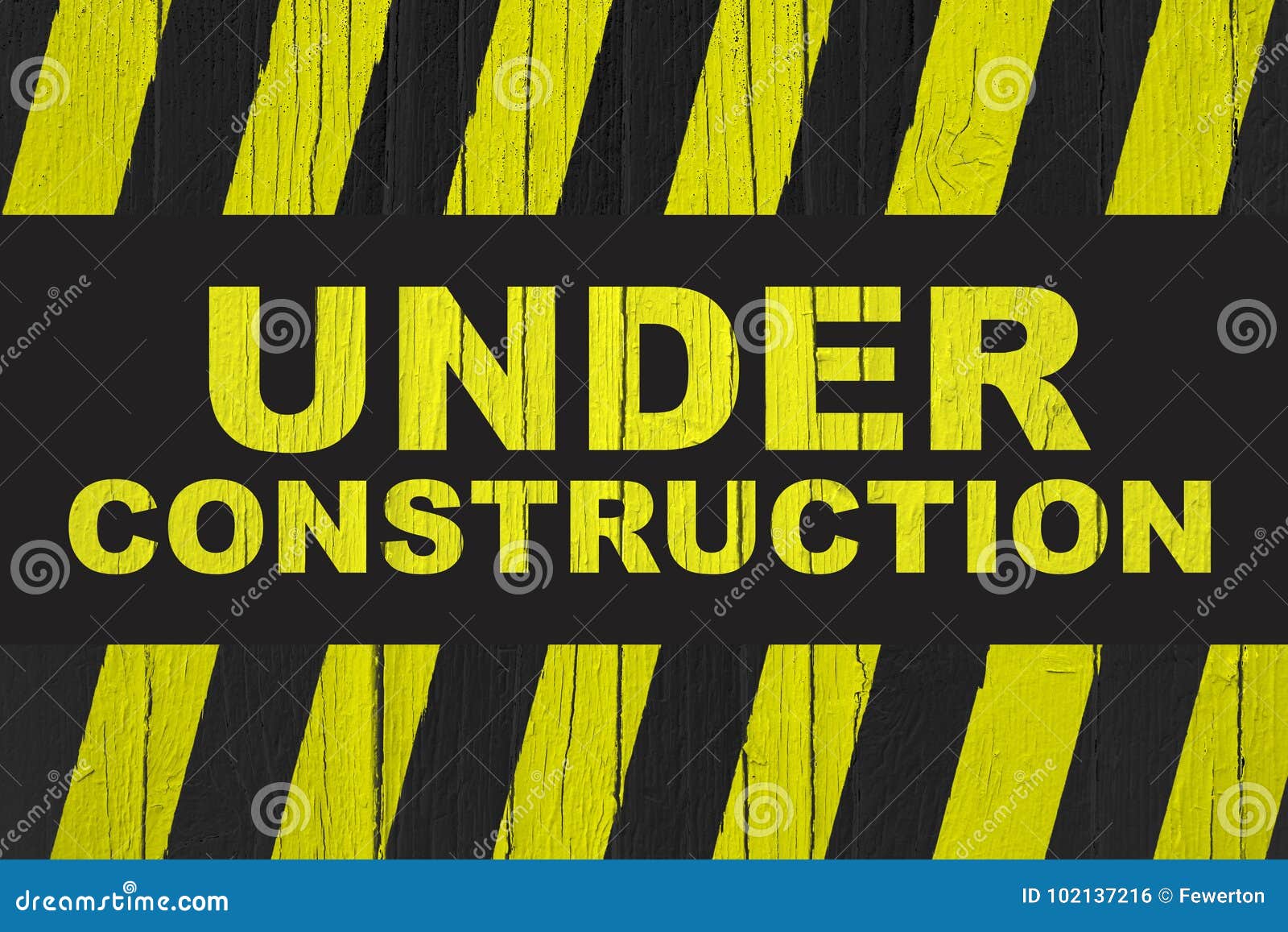 Under Construction Warning Sign with Yellow and Black Stripes Painted ...