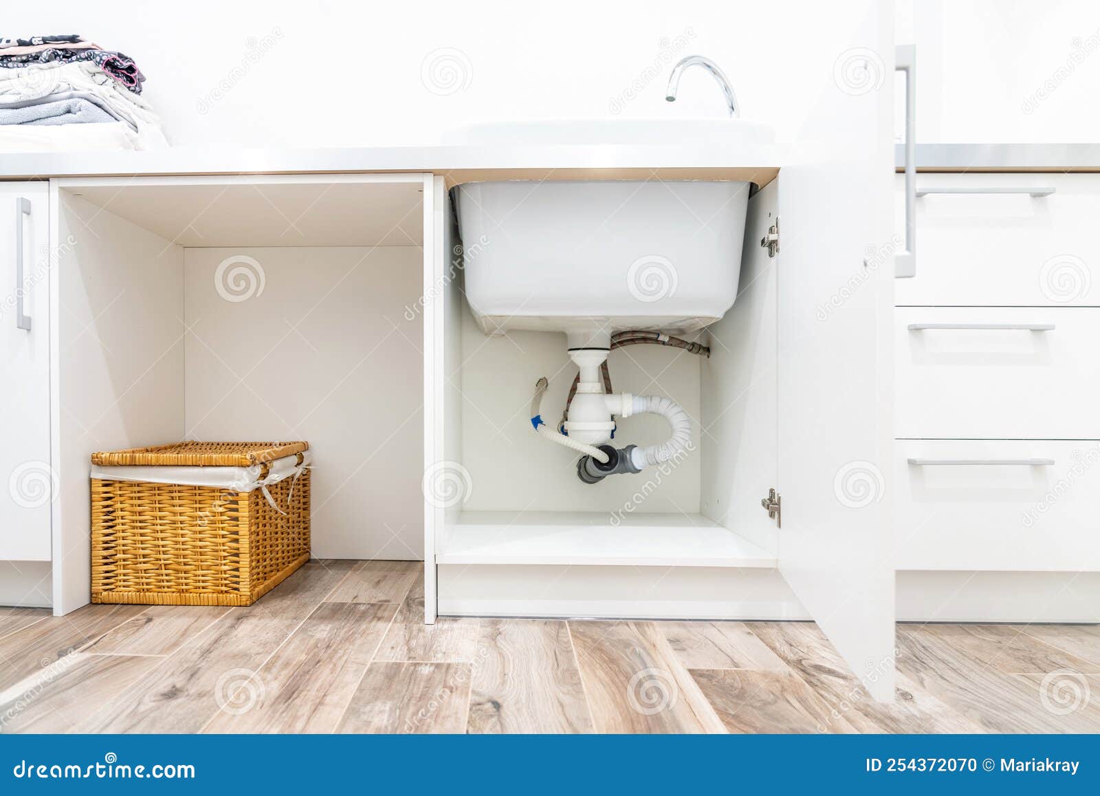 Under the Sink View in Laundry Room Stock Photo Image of house, tube