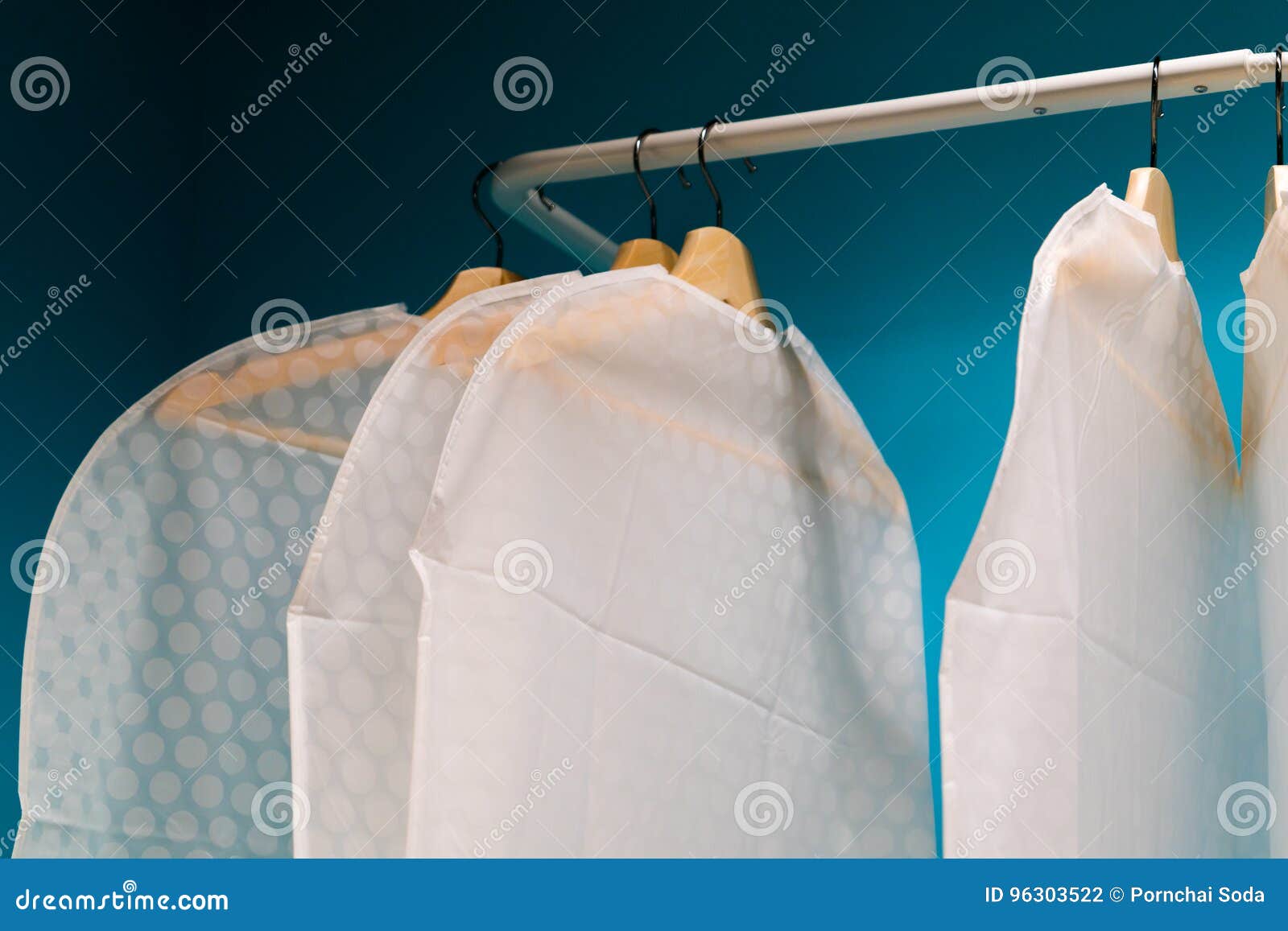 Underexposed of the Dress Cover on Hanger Stock Photo Image of