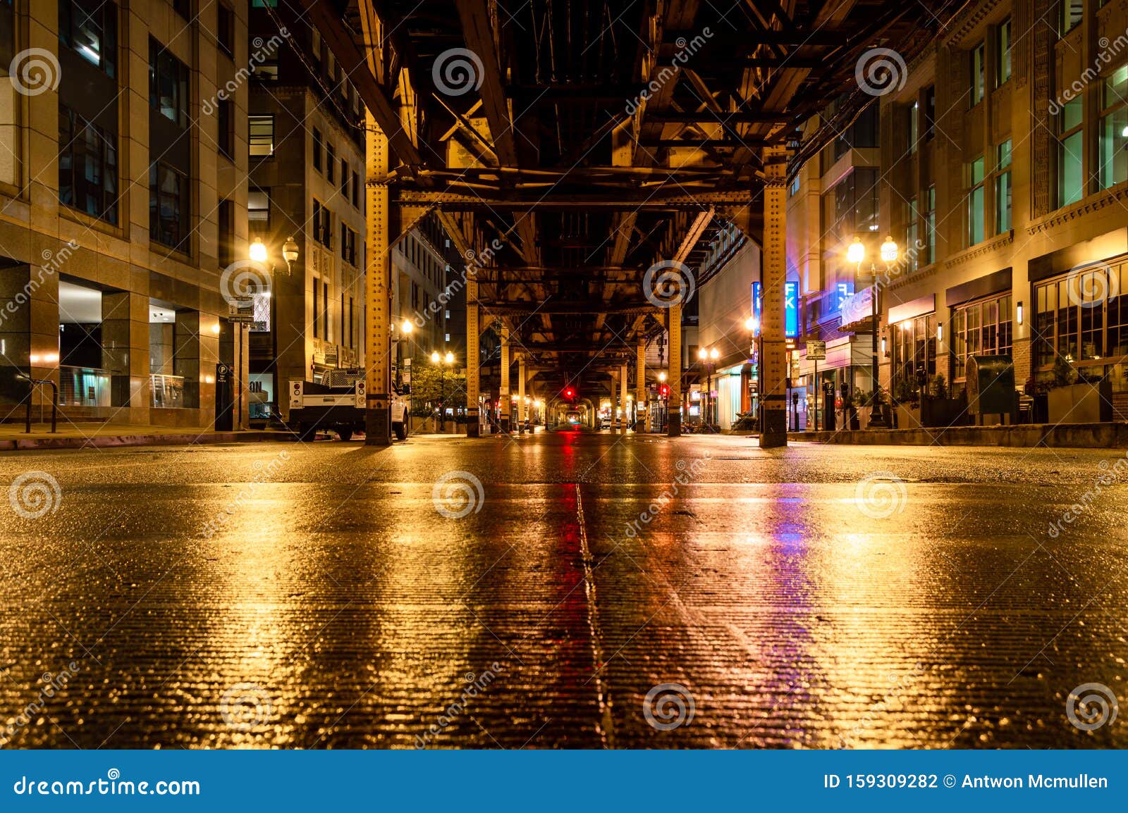 underneath the elevated train tracks in the chicago loop at night