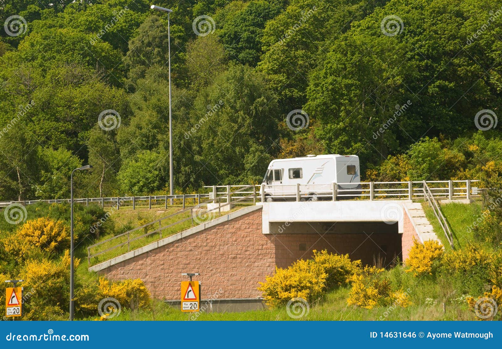 underpass with motorhome passing on the main road.