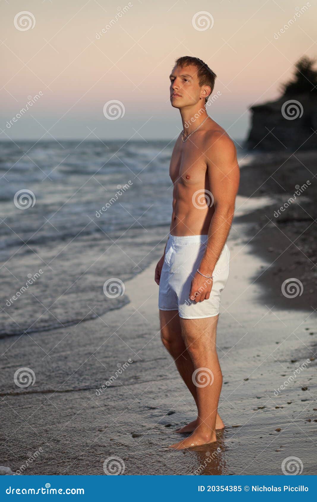 Underwear Model on Beach stock image. Image of shorts - 20354385