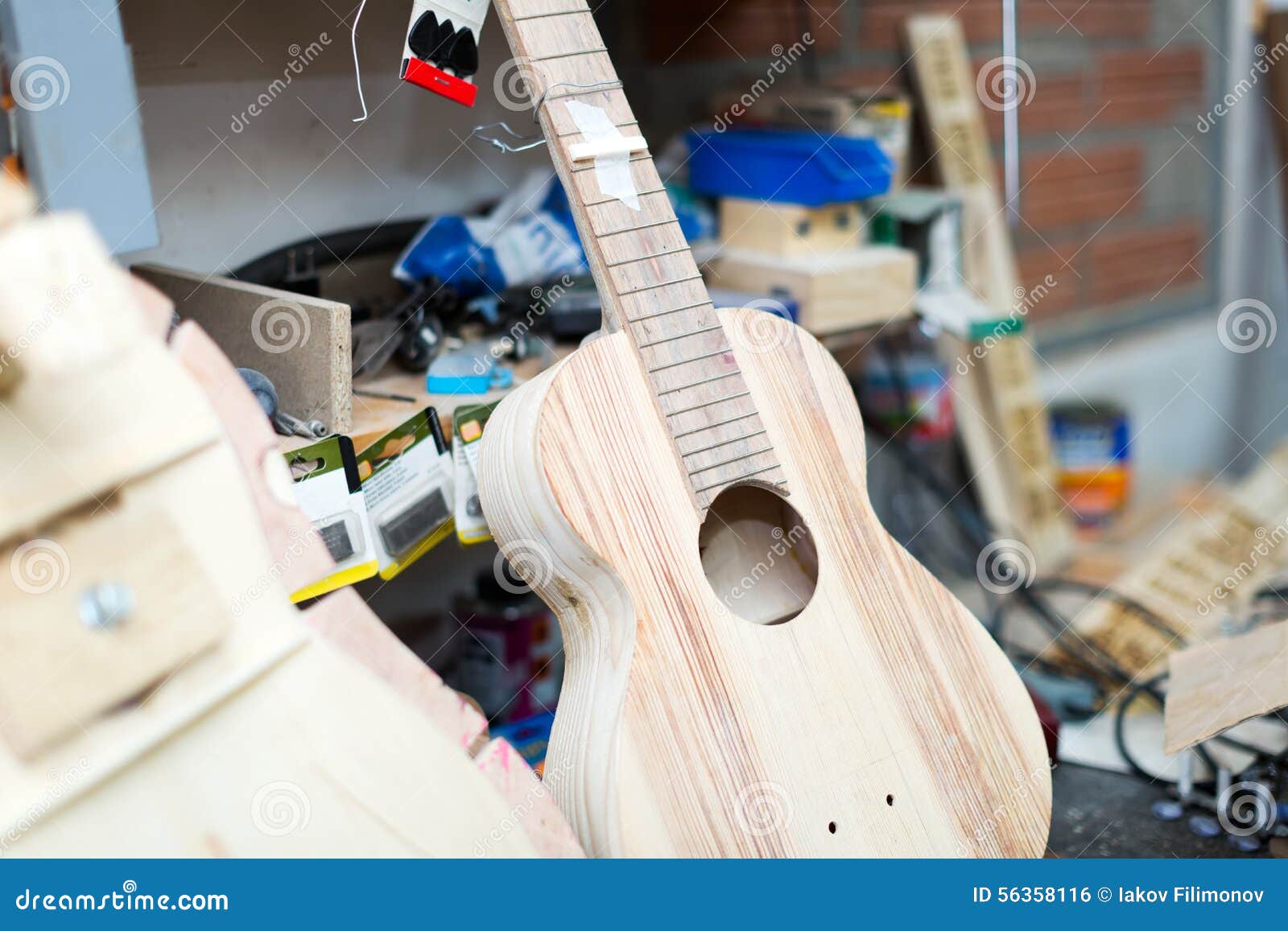 Unfinished acoustic guitar stock photo. Image of equipment 56358116