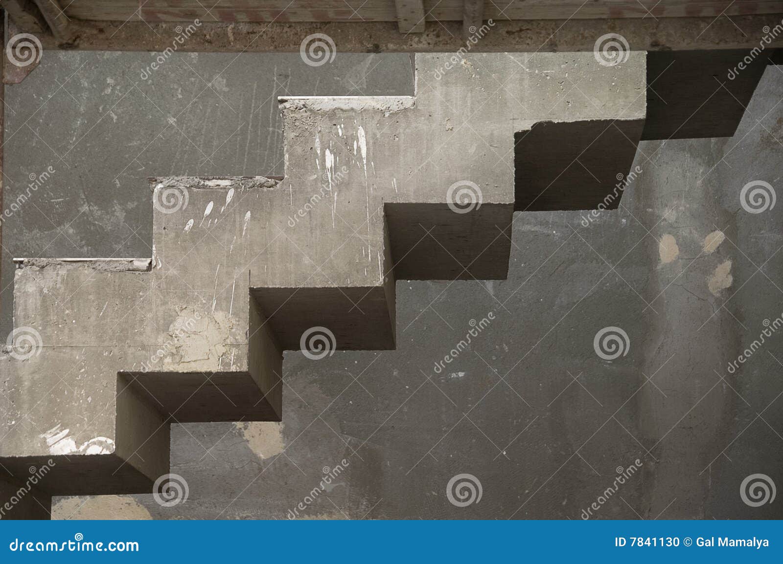 unfinished concrete stairs