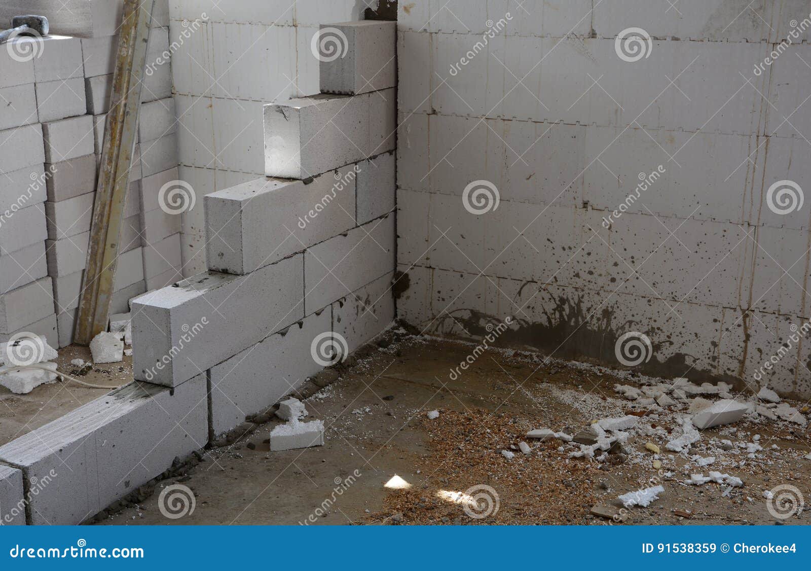 unfinished house wall made from aerated concrete blocks