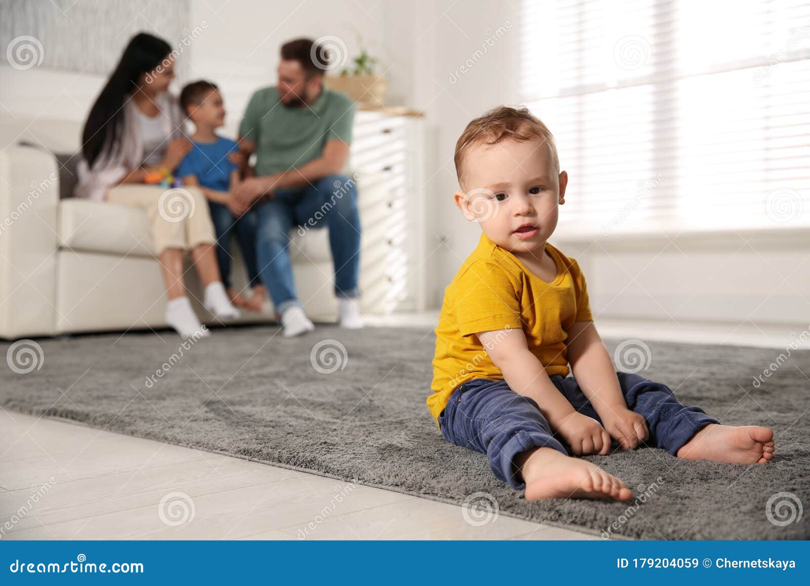Babies: Baby Is Sitting Alone - Stock Picture I2041693 at 