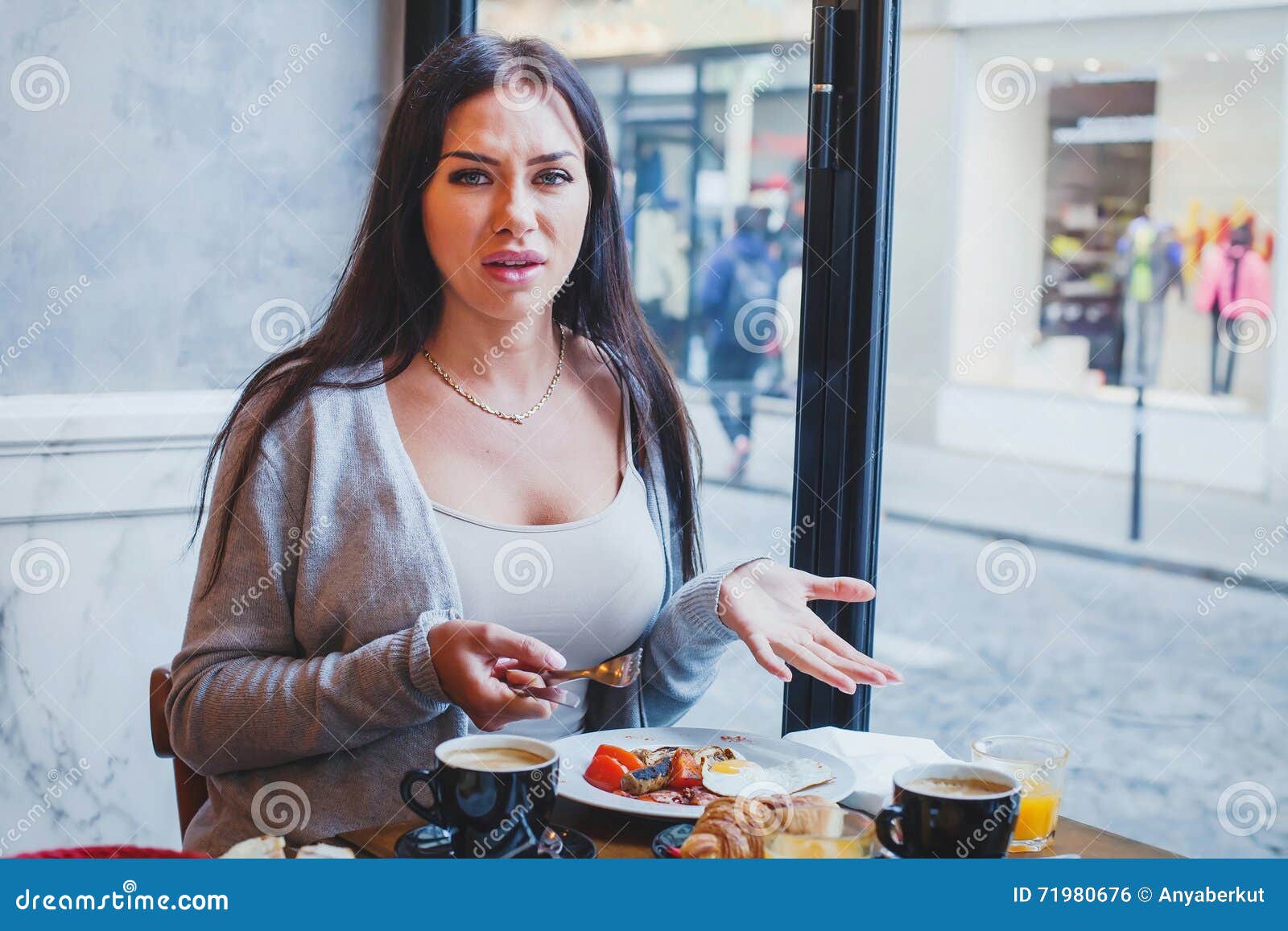 unhappy customer in restaurant, angry woman