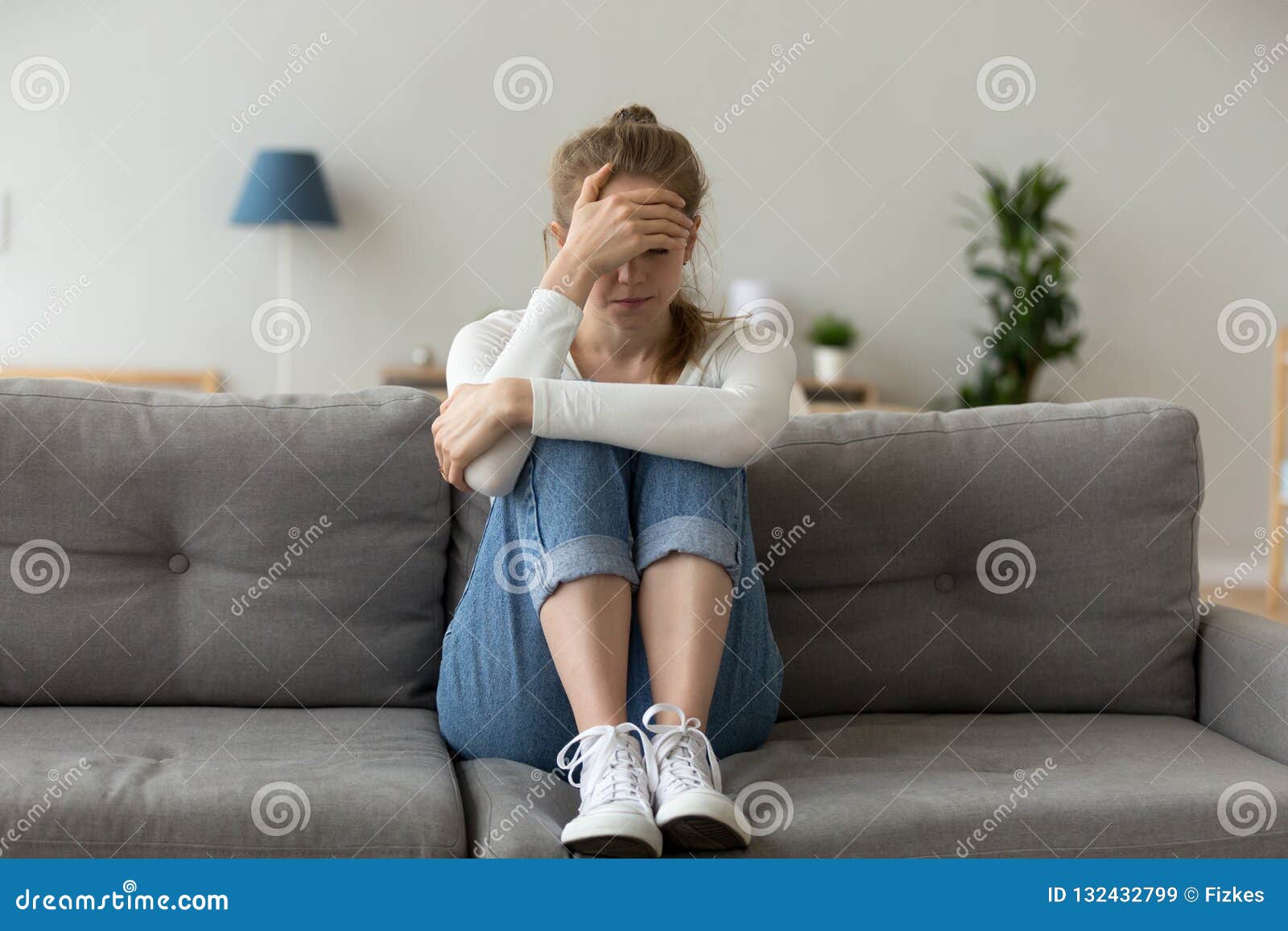 Unhappy Female Sit on Couch Feeling Sad at Home Stock Image ...