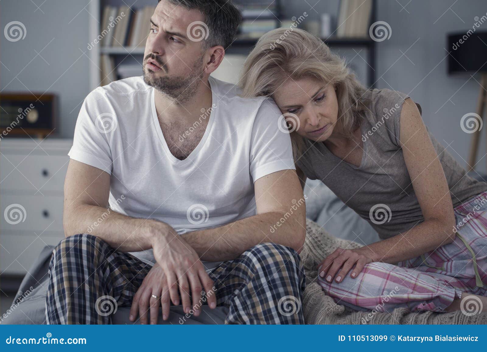 unhappy husband and sad wife