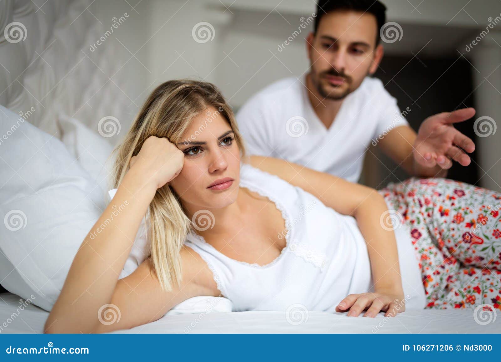 unhappy young couple having unsolved relationship problems