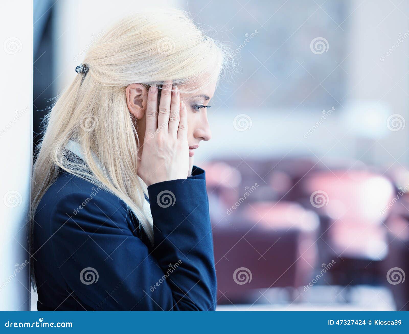 unhappy young business woman