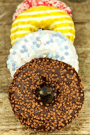 Unhealthy Food Donuts On A Wooden Table Dangers Of Obesity And Diabetes Sales Of Sweets Stock Unhealthy Food Donuts On A Wooden Table Dangers Of Obesity And Diabetes Sales Of Sweets Stock