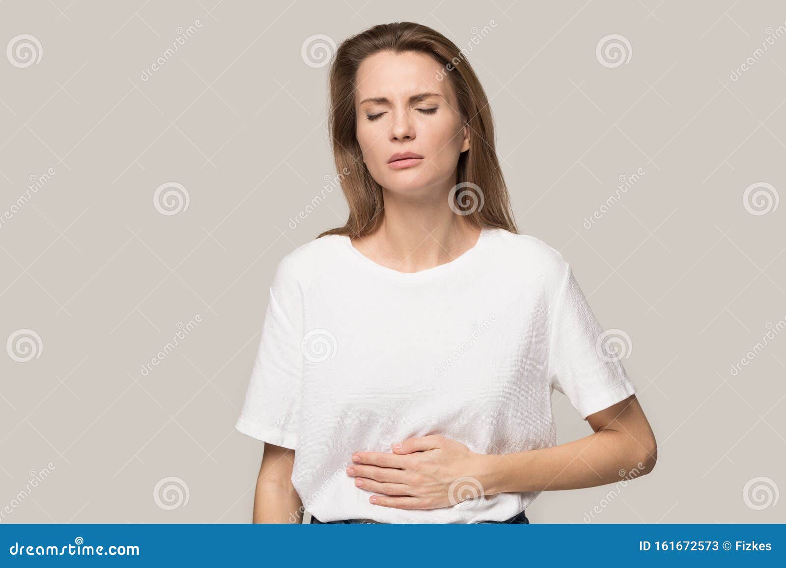 sick young woman touch stomach suffer from indigestion