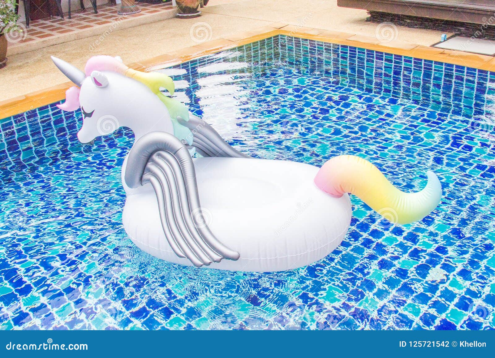 Unicorn flotation device stock photo. Image of pool 125721542