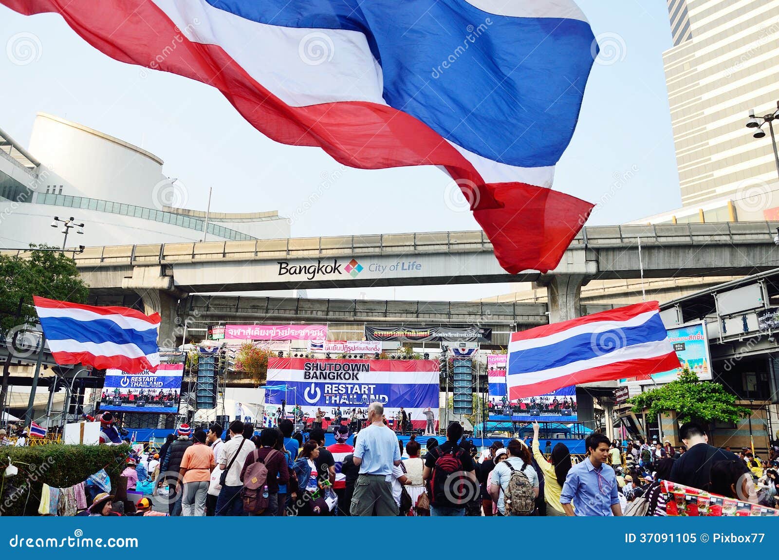 BANGKOK-JAN 22 : Unidentified protesters gather Patumwan intersection to anti government and ask to reform before election with Shutdown Bangkok concept on Jan 22, 2014 in Bangkok, Thailand.