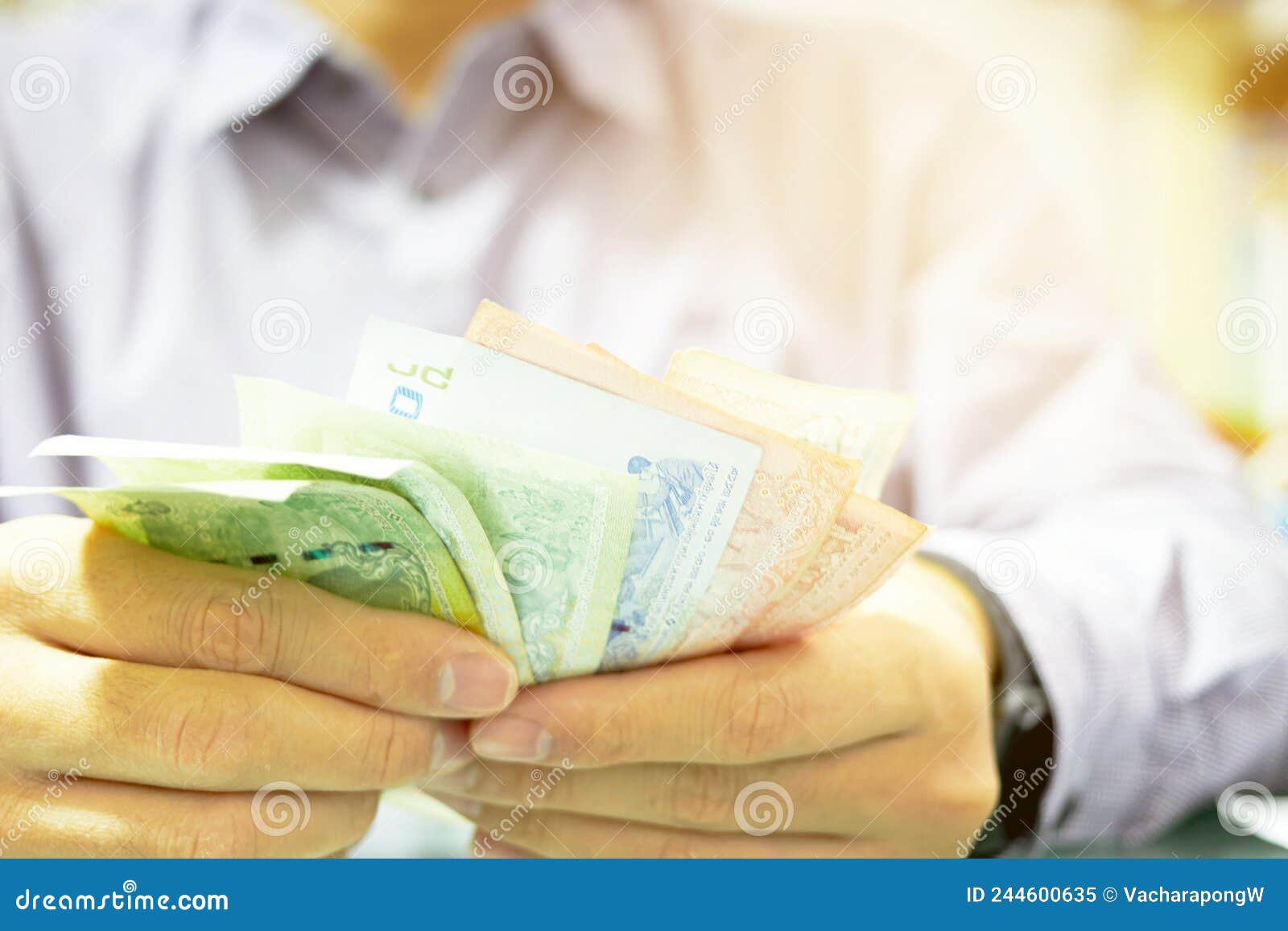 Uniform Man is Counting Money Banknote for Economic Crisis Problem