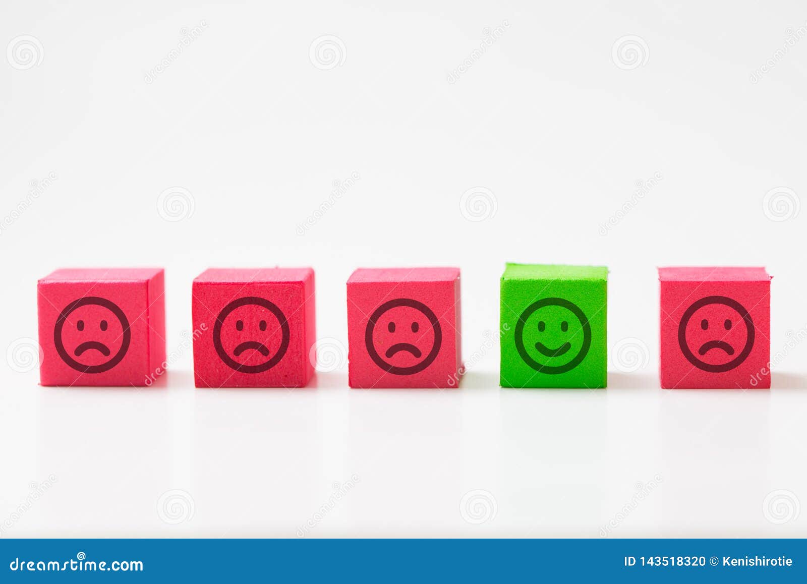 unique, optimistic, happiness, difference concept using single happy face among many sad faces.
