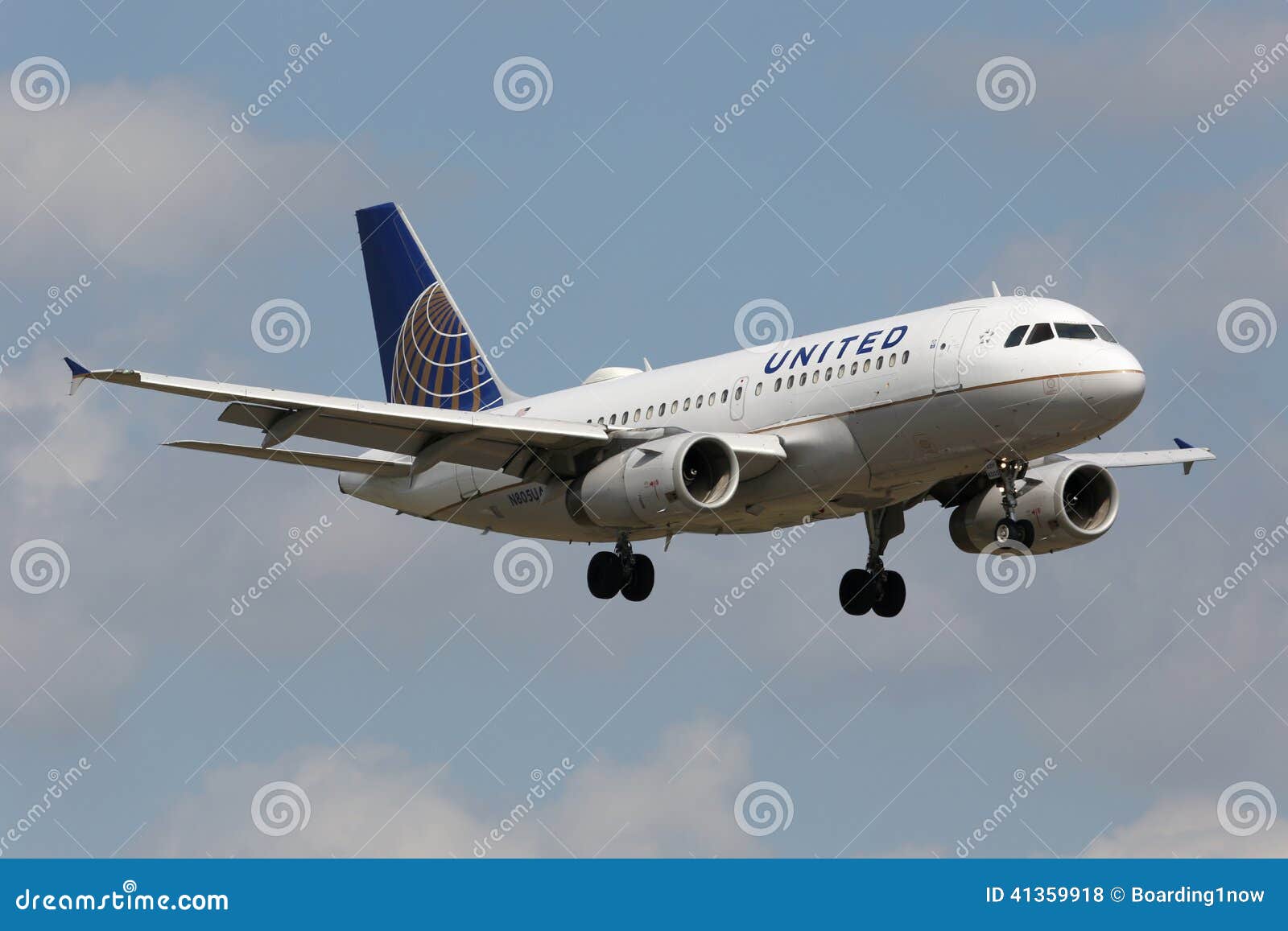 Miami, Florida - April 10, 2014: A United Airlines Airbus A319 with the registration N805UA on approach to Miami Airport (MIA) in Florida. United Airlines is the world s largest airline with 695 planes and some 92 million passengers in 2012. It is headquartered in Chicago, Illinois.