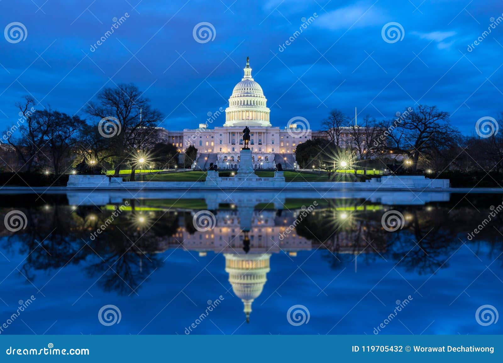 the united states capitol with reflection at night, washington dc