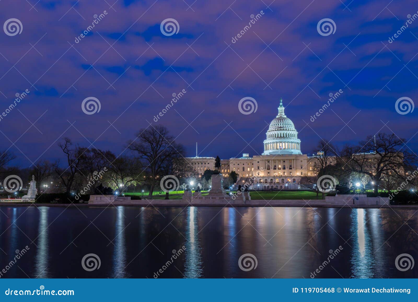 the united states capitol with reflection at night, washington dc, usa