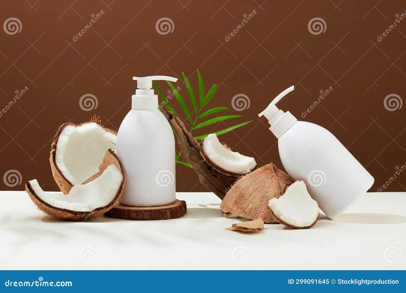 unlabeled shower gel bottles containing coconut extract are displayed with coconut flakes of different sizes. minimalist