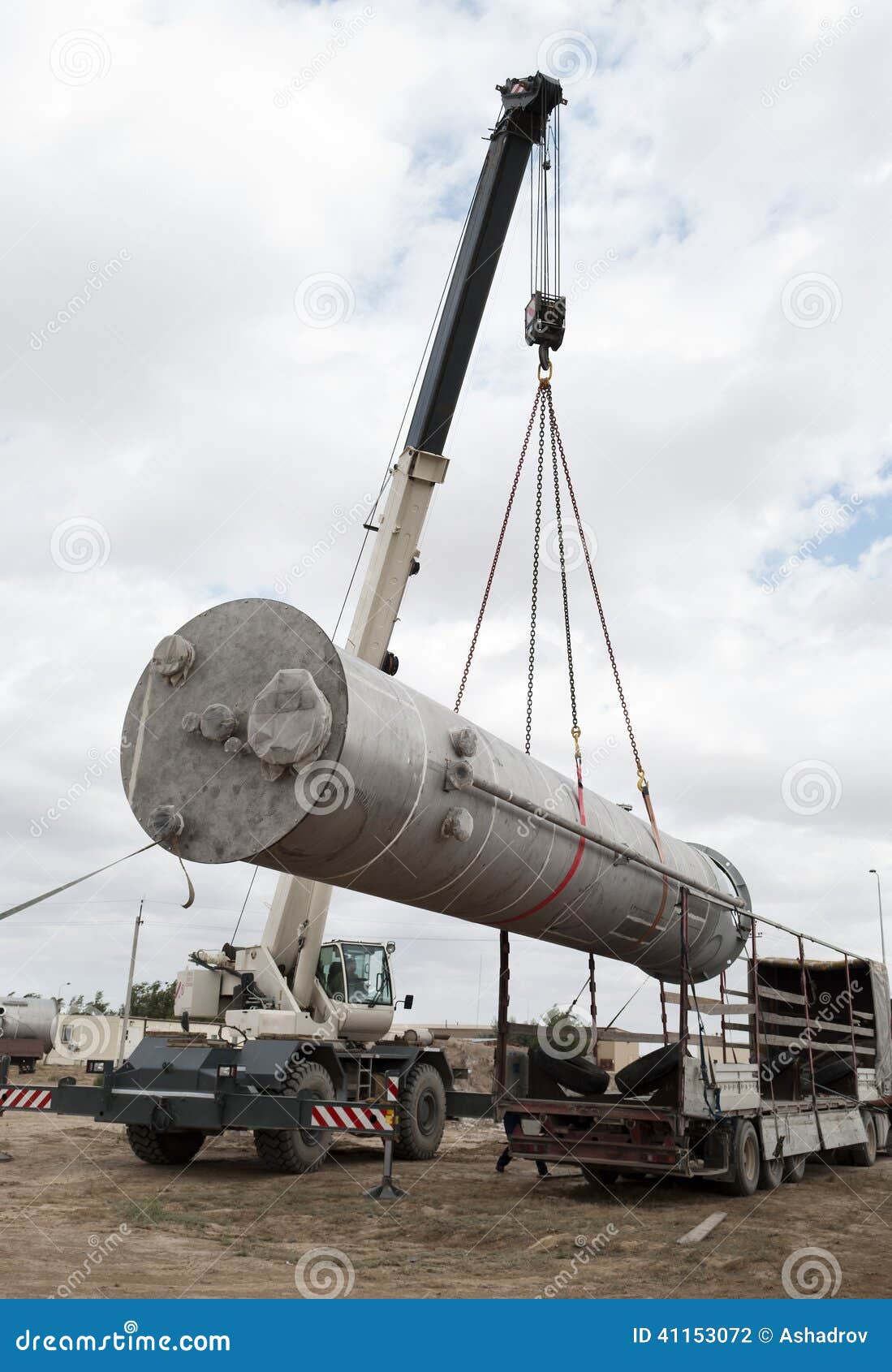 Unloading of Processing Equipment by Means of the Crane Stock Photo
